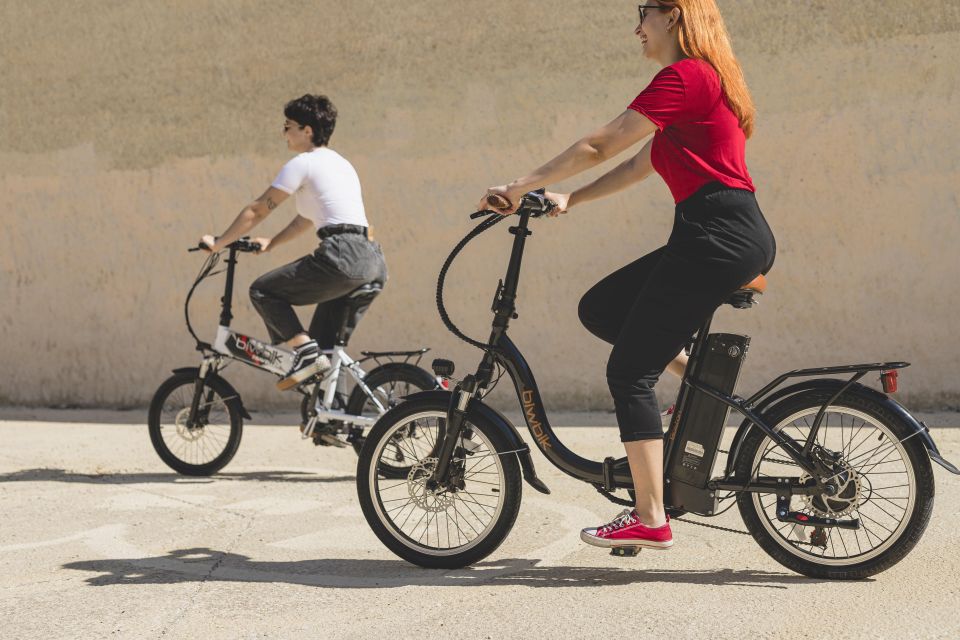 All Madrid: Private Electric Bike Tour around the city - Factor Street viewpoint to Almudena Cathedral: the “youngest cathedral” moment