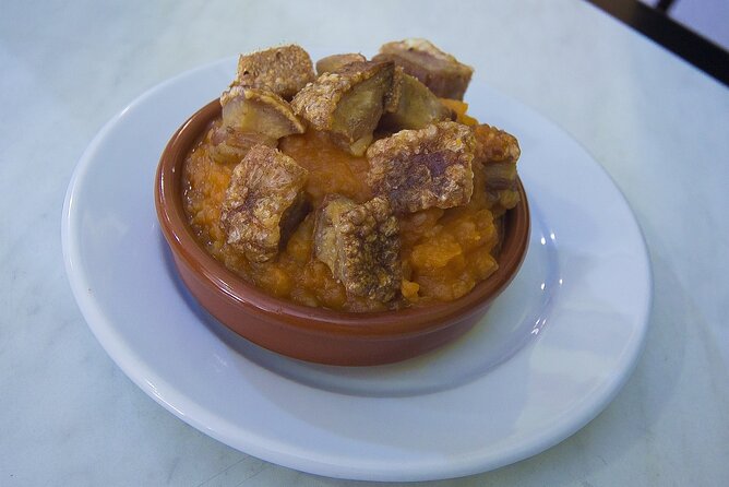 Gastronomic Tour: Discover the best “Wines and Tapas of Madrid” - Mercado Jamón Ibérico: The Iberian Product Story (Ham, Cheeses, Oils)