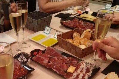 Iberian Ham and Wine Small Group Tour in Madrid - Two stops in Madrid’s Historical Quarter: tapas first, ibérico second