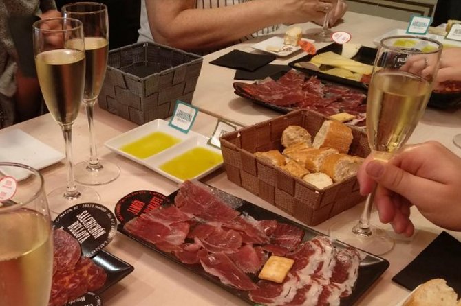 Iberian Ham and Wine Small Group Tour in Madrid - Two stops in Madrid’s Historical Quarter: tapas first, ibérico second