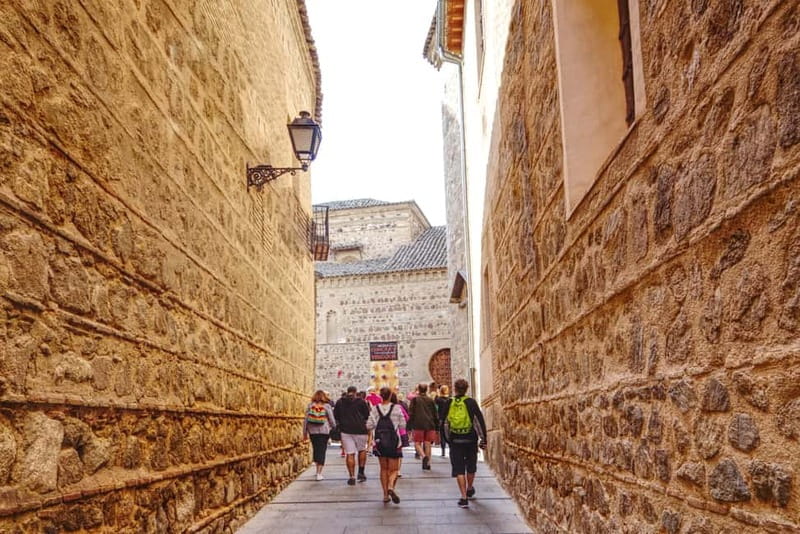 Madrid: 6-Hour Day Trip to Toledo with Guided Walking Tour - Getting to Toledo: Meeting Point and the Real Timing