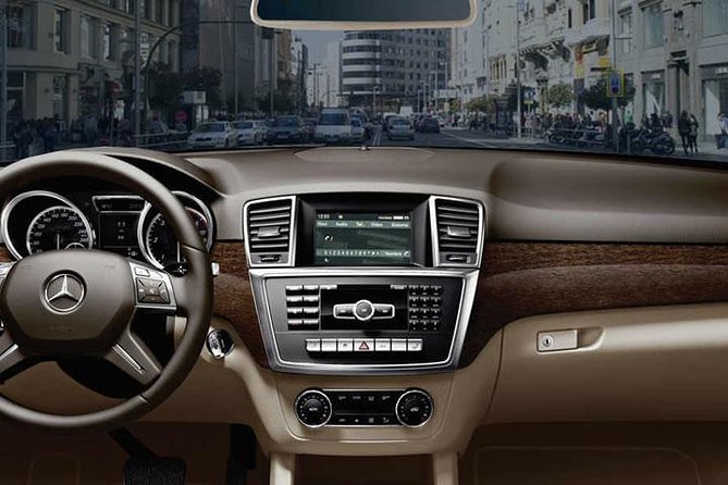 Madrid Airport to City Center: 1-Way Premium Private Transfer - Flight Delays and Early Arrivals: the 1-hour meet window