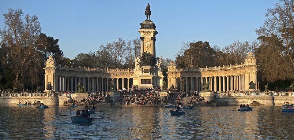 Madrid: Cibeles Rooftop & Retiro Park Guided Walking Tour - Retiro Park guided tour: Big Pond, Crystal Palace, and the Galapagos Fountain