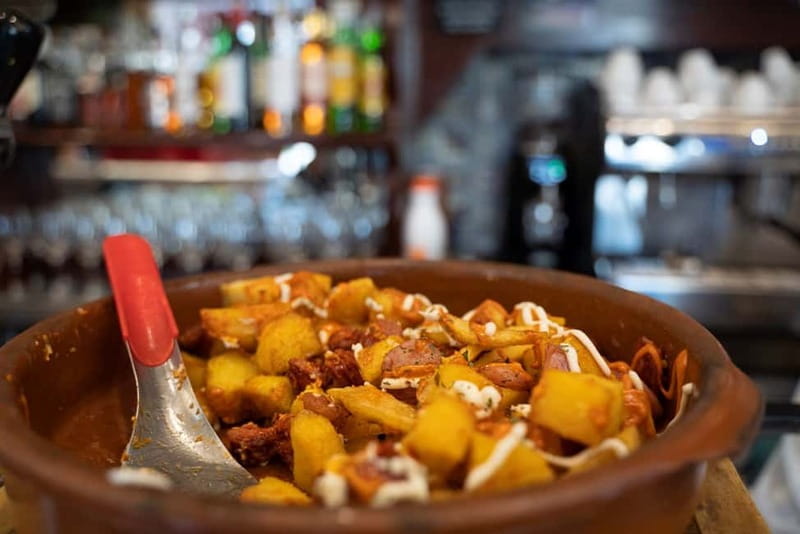 Madrid: Evening Tapas Tour with 5 Delicious Stops & Drinks - Dessert and the Finish Near Puerta del Sol