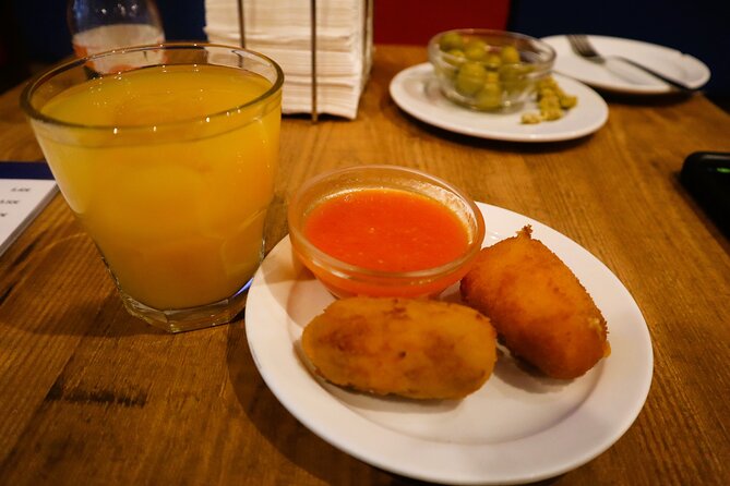 Madrid Food Tasting Tour of Hidden Gems (Small Groups) - Croquetas and Centollo Finale: Local Wine and Melt-in-Your-Mouth Comfort