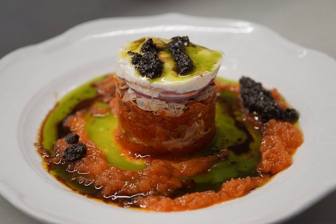 Madrid Gourmet Tapas Small Group Tour - Entering Madrid’s food world from the Retiro side