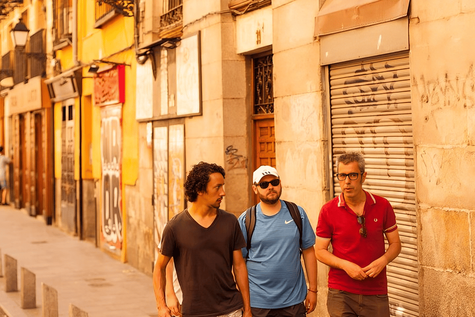 Madrid: Hidden Gems and Secrets Small Group Walking Tour - The city as a timeline: Muslim walls to Bourbon glamour
