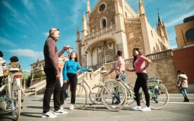Madrid: Highlights Guided Vintage Bike Tour and Tapas Option - Las Letras Quarter and Puerta del Sol: where the stories are short and sweet