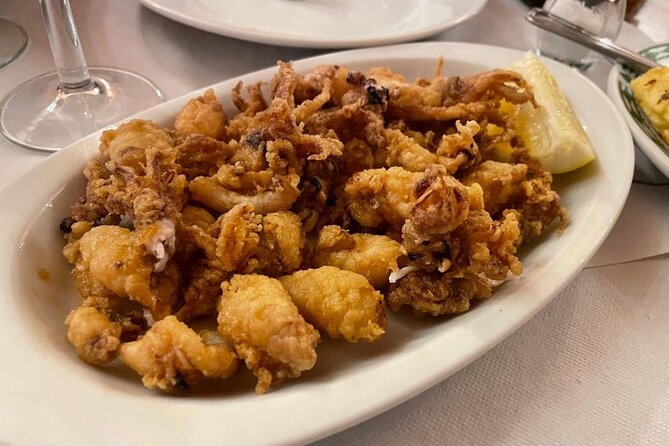 Madrid LGBTQ Tapas Tour - Calle de Hortaleza Market Stop: Eating Like Locals (Not Just Tourists)