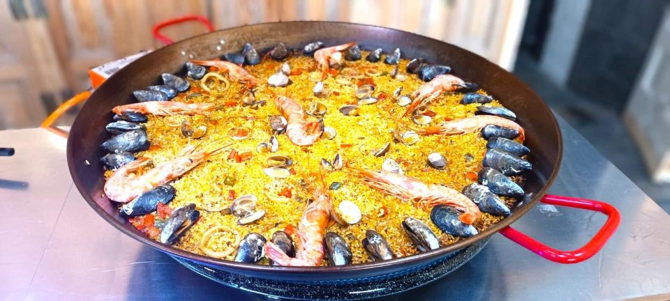 Madrid: Paella and Sangria Workshop with Tapas - What’s Included Beyond Paella: Omelette, Ham Toast, Tapas Bites, and Shots