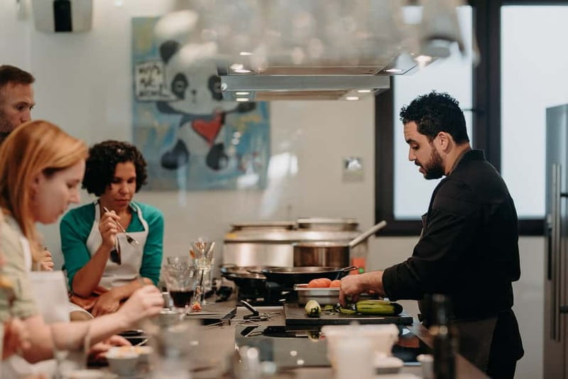Madrid: Paella & Tapas Cooking Class and Market Visit - Behind-the-scenes kitchen time in the Huertas neighborhood
