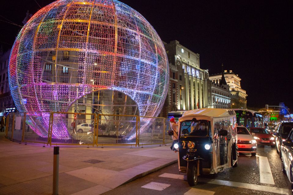 Madrid: Private Christmas Lights Tour by Eco Tuk-Tuk - Salamanca-style streets: shopping elegance with holiday lighting