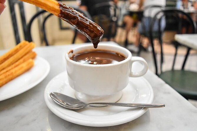 Madrid Segway Tour with Chocolate and Churros - Almudena Cathedral and the Royal Palace Area: Grand Stone, Up Close