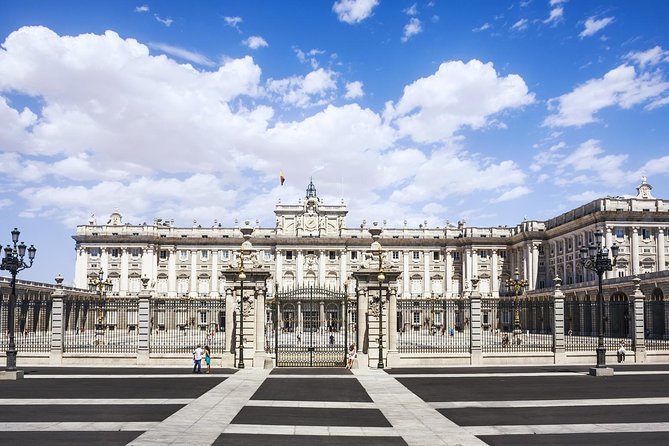 Madrid Sightseeing Tour with Royal Palace Skip the Line Ticket - Plaza Mayor and Puerta del Sol: your quick orientation shortcut