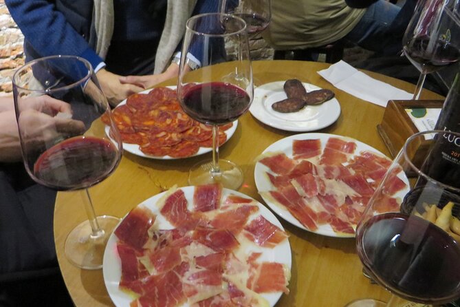 Madrid Small Group Tapas Tour at 4 Venues -Lunch or Dinner - The Old Town food court stop: variety, bread, and more than one flavor lane