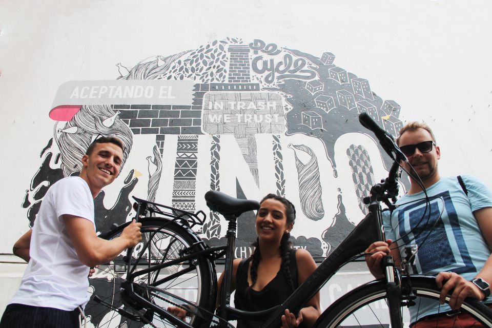 Madrid: Street Art Bike Tour - The Muelle tag from 1989: graffiti that never really left