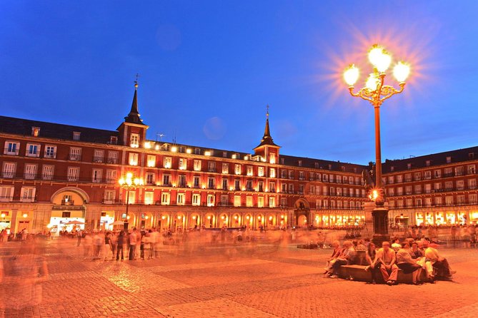 Madrid Sunset Walking Tour with Optional Flamenco Show and Dinner - Plaza Mayor: Km 0 and the New Year clock detail