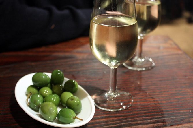 Madrid Tapas Experience Walking Tour - Drinks included: beer, tinto de verano, rebujito, and cider know-how