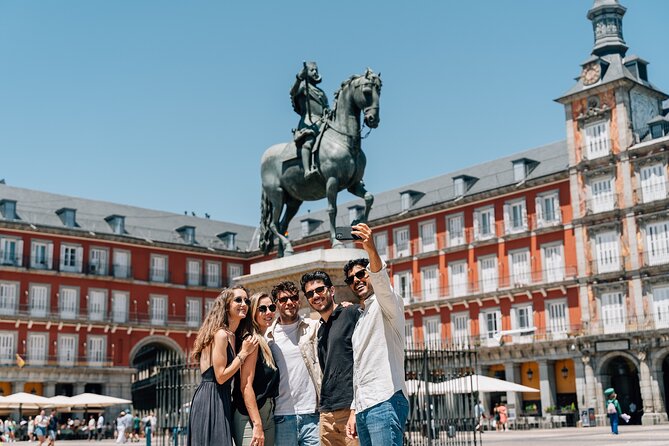 Madrid Tapas & Wine Tour with Rooftop Views and Local Guide - Calle de las Huertas and Carrilleras: The Hearty Madrid Moment