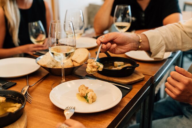 Madrid Tapas & Wine Tour with Rooftop Views and Local Guide - Rooftop Cava Views: What You Get on the 06:00PM Tour