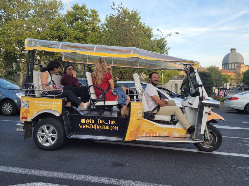 Madrid: Traditional Tour wh Private guide in yellow Tuk Tuk - Plaza Isabel II to Opera Square: getting your bearings fast