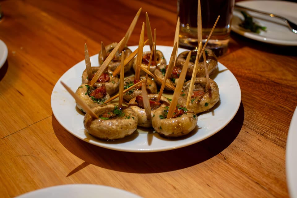 Madrid's Iconic Tapas, Taverns & History Experience - Royal Palace area: quick guided context, not a long ticket line