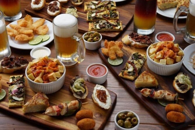 Private Madrid Tapas Tour - Classic Madrid plates you’ll likely see: jamón and patatas bravas