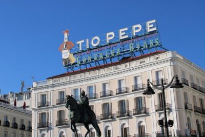 Private Walking Tour of the Center of Madrid and Retiro - Plaza de las Cortes and Neptune: the statue detail that gives the square meaning