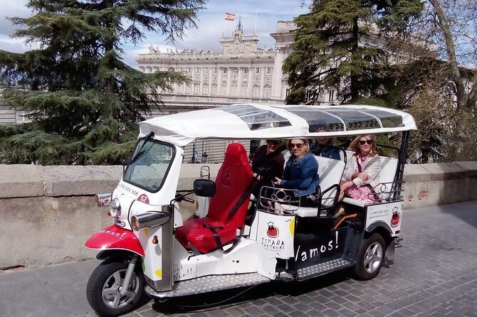 Tour Madrid in 2 hours! Electric Tuk - Fast, Fun, and Exclusive - Almudena Cathedral Museum + the Sabatini Gardens: church details and palace views